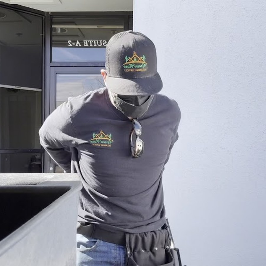 Green Rose technician in uniform on commercial cleaning job