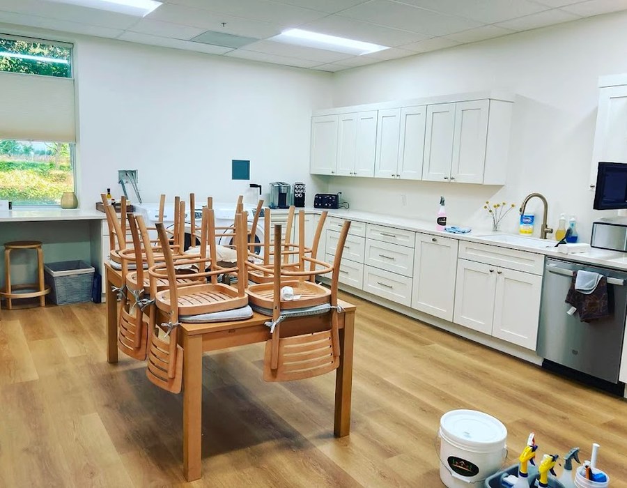 Office break room mid-clean by Green Rose